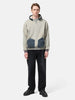 Model standing in studio wearing the   A.PRESSE Vintage Attached Hood Sweat Parka in Oatmeal
