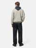 Rear view of the Model standing in studio wearing the A.PRESSE Vintage Attached Hood Sweat Parka in Oatmeal