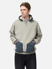 Hlaf body shot of the Model standing in studio wearing the A.PRESSE Vintage Attached Hood Sweat Parka in Oatmeal