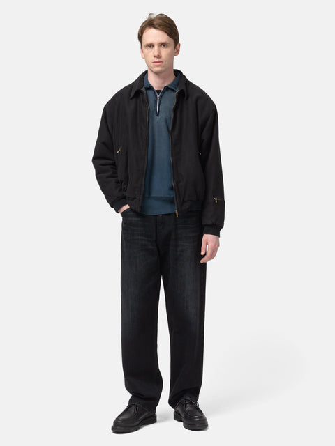 Model standing in studio wearing the A.PRESSE Vintage Cotton Silk Moleskin Jacket in Black 