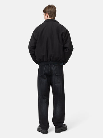 Rear shot of the Model standing in studio wearing the A.PRESSE Vintage Cotton Silk Moleskin Jacket in Black 