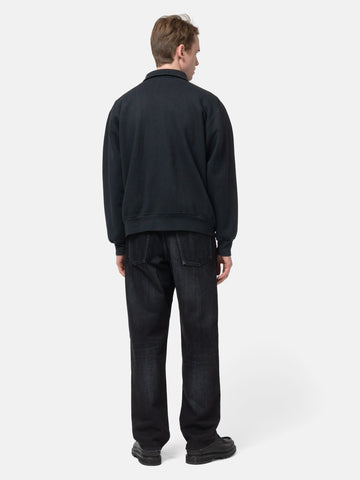 rear view of the model standing in studio wearing the A.PRESSE Vintage Sweat Cardigan in Black