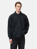 Half body shot of the model standing in studio wearing the A.PRESSE Vintage Sweat Cardigan in Black