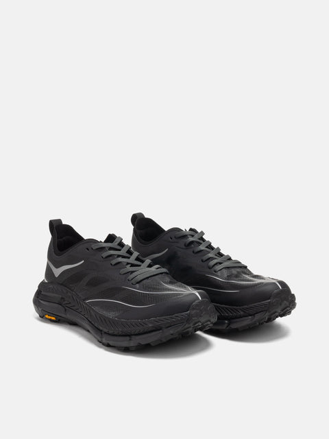 three quarter view of the HOKA U Mafate Speed 4 Lite Black / Outer Orbit