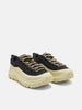 three-quarter view of the HOKA U Tor Summit Black / Pampas Grass