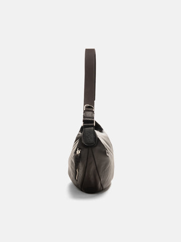 Side view of the LEMAIRE Quiver Clip Bag Dark Chocolate