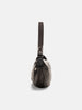 Side view of the LEMAIRE Quiver Clip Bag Dark Chocolate