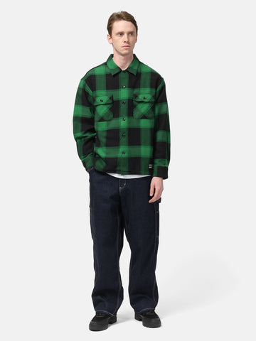 full-body view of model wearing NEIGHBORHOOD Denim Painter Pants Indigo