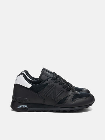 Side shot of the New Balance x WTAPS MiUSA 1300 Black