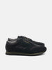 Side view of the Reproduction of Found British Military Trainer in Black premium suede and nylon photographed in studio.