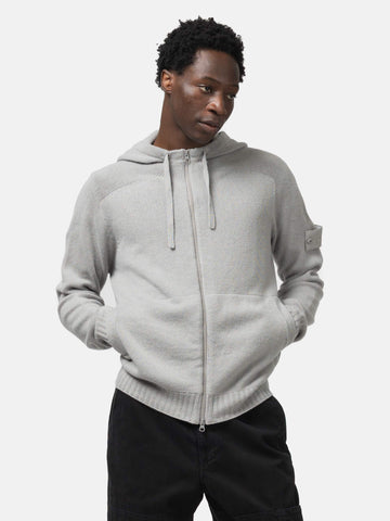 Half body shot of the model wearing the Stone Island Ghost Piece Cashmere Hoodie Dust
