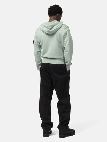 Back shot of the model wearing the Stone Island Organic Cotton Hooded Sweatshirt Sage