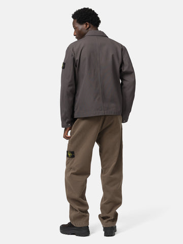 Back shot of the model wearing the Stone Island Organic Cotton Patch-Pocket Cargo Trouser Brown
