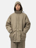 Half body shot of the Model wearing the organic cotton chino half coat from URU.