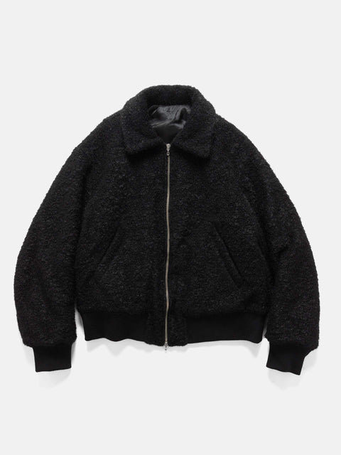 Flat shot in studio of the Wool Boa Zip-up blouson from URU.