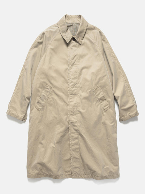 Flat shot of the UNLIKELY Balmacaan Coat in Beige