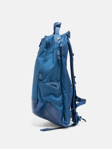 Side view of the Visvim Cordura 20L backpack in Blue
