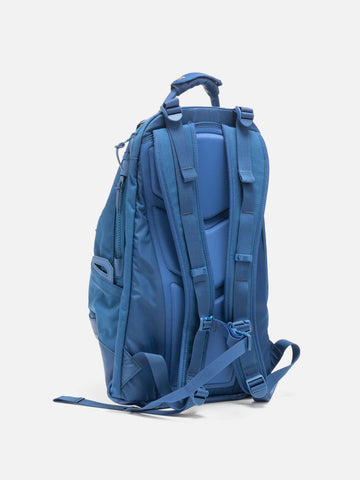Rear view of the Visvim Cordura 20L backpack in Blue