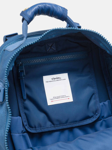 Detail view of the interior of the Visvim Cordura 20L backpack in Blue