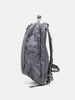 Side view of the Visvim Cordura 20L backpack in charcoal.