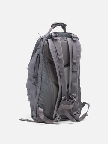 Rear view of the Visvim Cordura 20L backpack in charcoal.