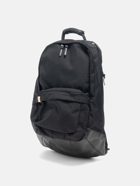 Studio shot of the Visvim Cordura 22L backpack in black