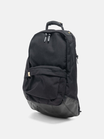 Studio shot of the Visvim Cordura 22L backpack in black
