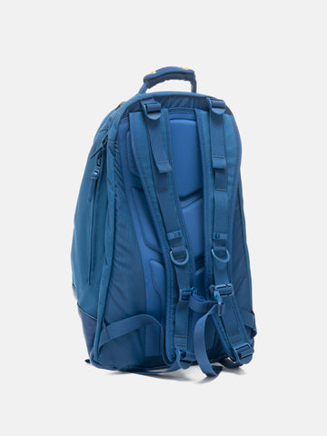 Rear view of the Visvim Cordura 22L backpack in BLue