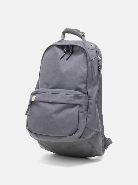 Studio shot of the Visvim Cordura 22L backpack in Charcoal