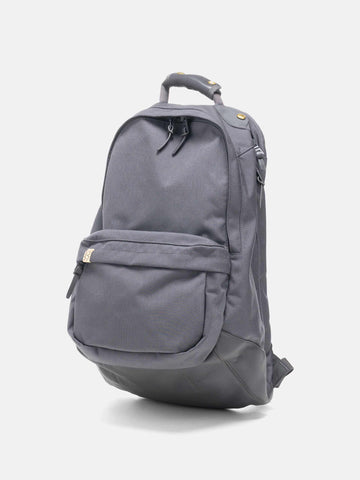 Studio shot of the Visvim Cordura 22L backpack in Charcoal