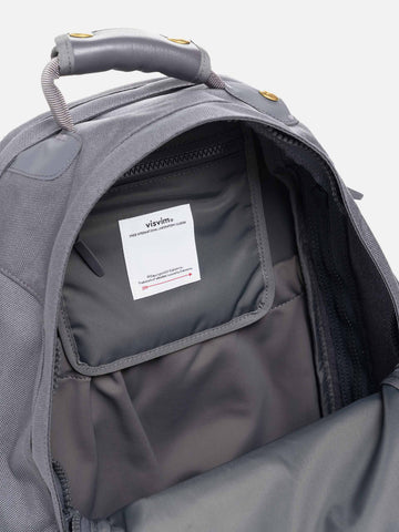 Detail view of the interior of the Visvim Cordura 22L backpack in Charcoal