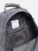 Detail view of the interior of the Visvim Cordura 22L backpack in Charcoal