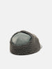 Rear view of the WTAPS AVT Cap Nylon Satin Cordura Olive Drab with ear flap attached