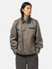 half-body view of model wearing sacai cotton chino blouson gray