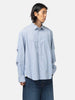 half-body view of the model wearing the sacai Poplin Shirt Blue Stripe