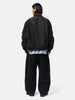 rear view of the model the sacai Sponge Sweat Pants Black