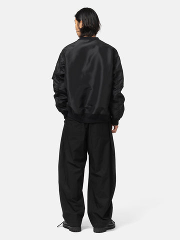 rear view of the model wearing the sacai Sponge Sweat Pullover Black