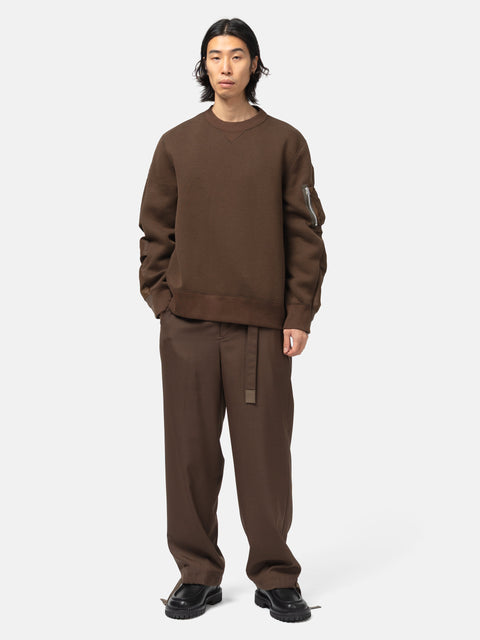Full-body view of the model wearing the sacai Sponge Sweat Pullover Brown