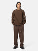 Full-body view of the model wearing the sacai Suiting Pants Brown